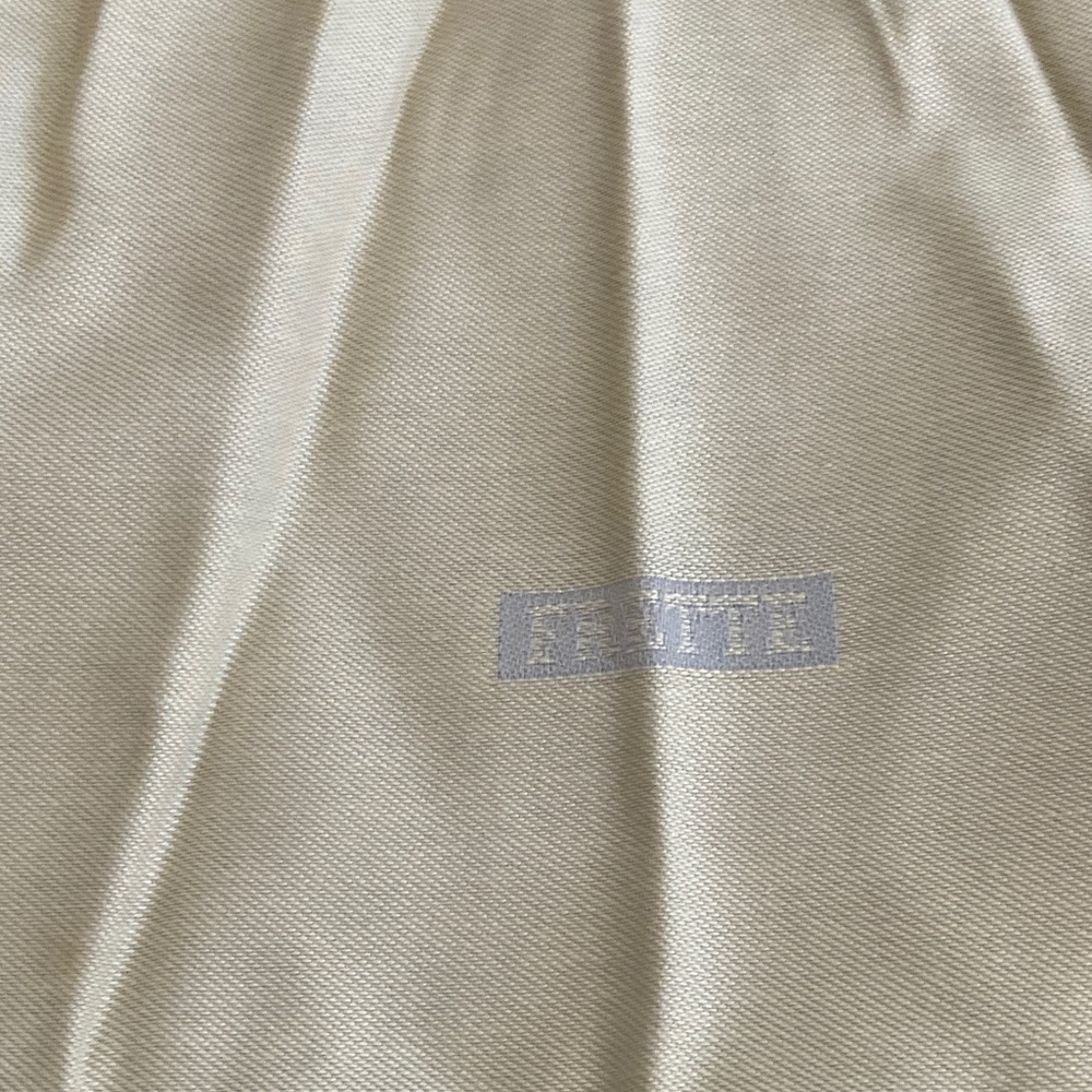 NEW FRETTE SET OF FOUR COLOR IS LIKE A FLAX WITH GREY/SILVER OTHER SIDE NWOT